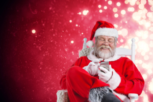 Santa checking his cell phone
